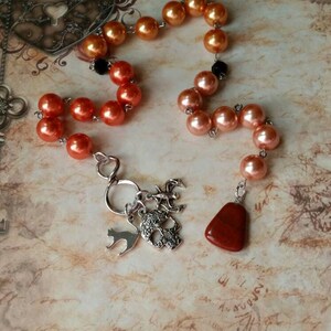 Samhain prayer beads, pagan prayer beads, Samhain witches prayer beads, stainless steel, glass pearls, Red Jasper, three spooky charms