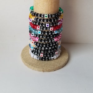 Sets of 12 friendship bracelets, beaded Swiftie bracelets, Eras themed friendship bracelets, stretchy bracelets, swappable concert bracelets