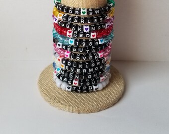 Sets of 12 friendship bracelets, beaded Swiftie bracelets, Eras themed friendship bracelets, stretchy bracelets, swappable concert bracelets