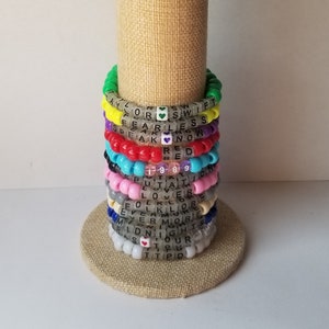 Sets of 12 friendship bracelets, beaded T Swift bracelets, Eras tour friendship bracelets, swappable concert bracelets, including TTPD