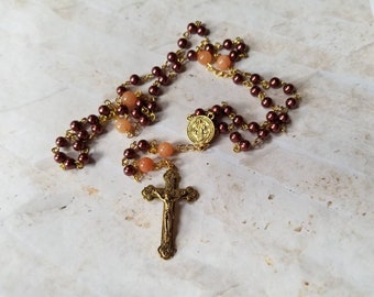 Catholic Five decade rosary, brown glass pearls, St Benedict center, budded crucifix, butterscotch Malay jade, gemstone beads,