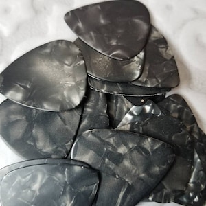 Destash guitar picks,  plectrums, pearl guitar picks, black, glossy or not so glossy, destash guitar plectrums, generic picks, 20 or 50