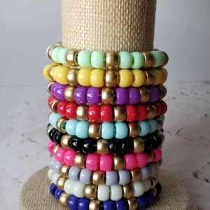 Sets of 10 friendship bracelets, beaded Swiftie bracelets, Eras themed friendship bracelets, stretchy bracelets, swappable concert bracelets