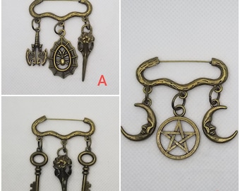Goth brooch pin, Pagan jewelry, three charm pin, Spooky jewelry, Goddess pin, Raven skull pin, cosplay jewelry, Goth jewelry, bronze pin