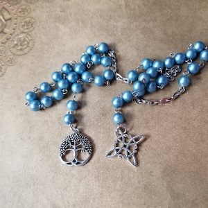Witches ladder, pagan prayer beads, Wiccan beads, stainless steel, blue satin matte glass, Witches knot charm, tree of life charm, Wiccan