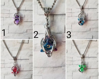 Captive dice jewelry, captured d4 necklace, dice jail necklace, dnd dice jewelry, d4 pendant, caged necklace, chain maille