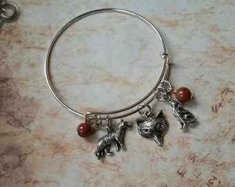 Mabon bangle, expandable bangle, Mabon jewelry, matches prayer beads, Mabon Sabbat bracelet, three wolves, Goldstone beads, wolf bangle