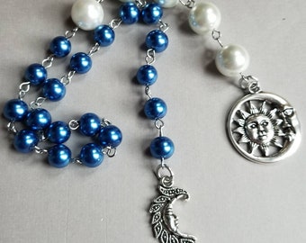 Baha'i prayer beads, 19 and 5 prayer beads, hand-wired, stainless steel, navy and white glass pearls, sun and moon charms, blue Baha'i beads