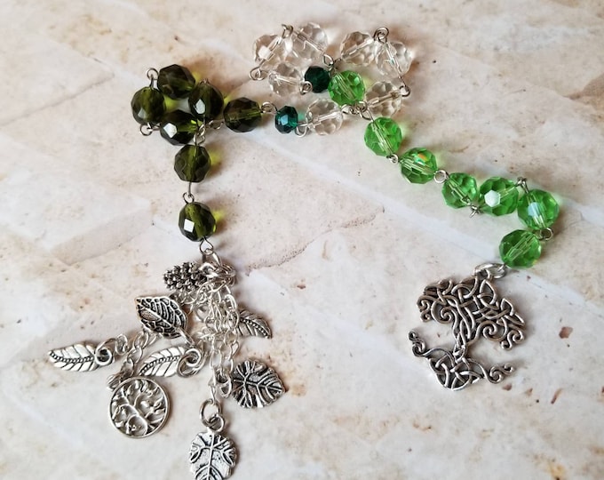 Featured listing image: Yule prayer beads, pagan prayer beads, witches prayer beads, stainless steel pins, green and clear faceted glass, Celtic tree, one of a kind
