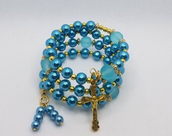 Five decade rosary bracelet, memory wire bracelet, wrap bracelet, blue glass pearls, blue rubberized glass beads, gold crucifix, religious