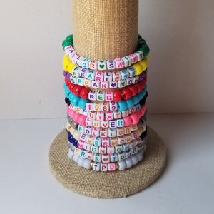 Sets of 12 friendship bracelets, beaded Swiftie bracelets, Eras themed friendship bracelets, stretchy bracelets, swappable concert bracelets