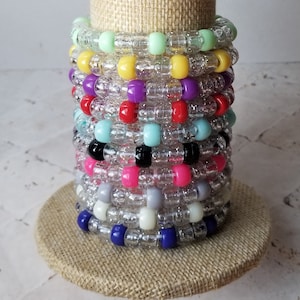Sets of 10 friendship bracelets, beaded Swiftie bracelets, Eras themed friendship bracelets, stretchy bracelets, swappable concert bracelets