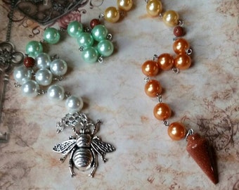 Beltane prayer beads, pagan prayer beads, witches prayer beads, stainless steel, glass pearls, Goldstone pendulum, large bee charm, honey