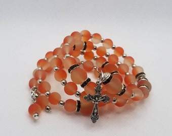 Five decade rosary bracelet, memory wire bracelet, wrap bracelet, orange rubberized frosted glass beads, religious bracelet, silver