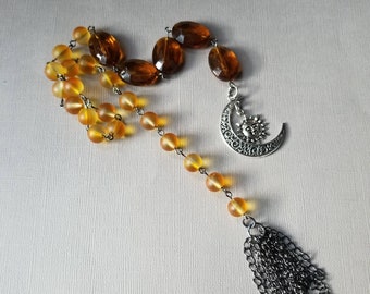 Baha'i prayer beads, 19 and 5 prayer beads, hand-wired, yellow frosted glass, moon and sun charms, handmade chain tassel, faceted topaz bead