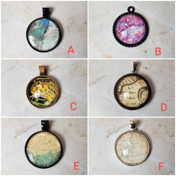 Peach blossom, photo behind glass, frog pendant, map pendants, glass and silicone cabochons, assorted photo jewelry, old maps