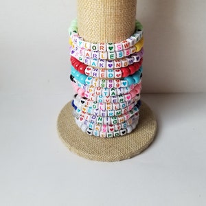 Sets of 12 friendship bracelets, beaded Swiftie bracelets, Eras themed friendship bracelets, stretchy bracelets, swappable concert bracelets