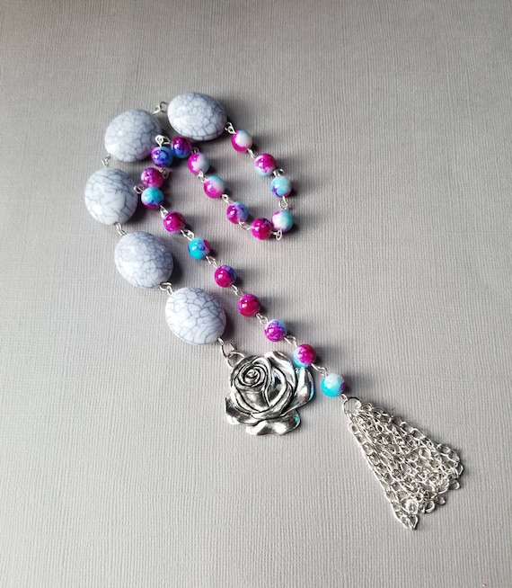 Baha'i prayer beads, Tye-dyed and ivory 19 and 5 prayer beads in silver tone with large rose charm and handmade chain tassel