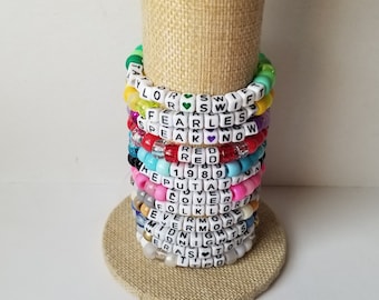 Sets of 12 friendship bracelets, beaded Swiftie bracelets, Eras themed friendship bracelets, stretchy bracelets, swappable concert bracelets
