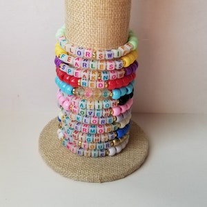 Sets of 12 friendship bracelets, beaded Swiftie bracelets, Eras themed friendship bracelets, stretchy bracelets, swappable concert bracelets