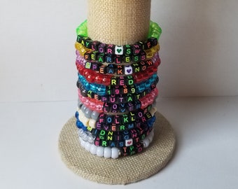 Conjuntos de 12 pulseras de la amistad, pulseras Swiftie con cuentas, pulseras de la amistad temáticas de Eras, pulseras elásticas, pulseras de concierto intercambiables