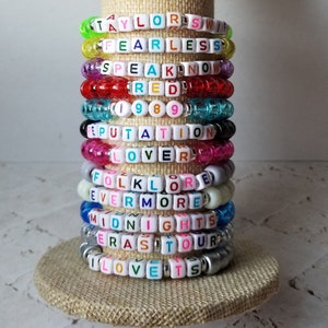 Sets of 12 friendship bracelets, beaded Swiftie bracelets, Eras themed friendship bracelets, stretchy bracelets, swappable concert bracelets
