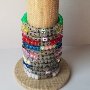 Sets of 12 friendship bracelets, beaded T Swift bracelets, Eras tour friendship bracelets, swappable concert bracelets, including TTPD