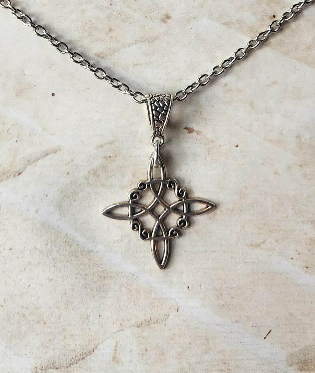 Silver-toned Metal Witches Knot Pendant Necklace With a Stainless Steel ...