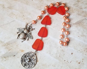 Baha'i prayer beads, 19 and 5 prayer beads, hand-wired, stainless steel, peach glass pearls, tangerine sea glass, mandala charm, bee charm