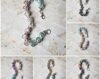 Captive bead bracelet, LGBTQ captured pearl jewelry, chain maille bracelet, captive pearl bracelet, caged bead bracelet, pride chain maille