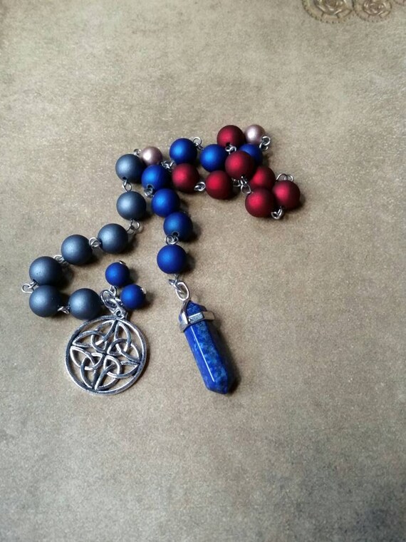 Pagan prayer beads, Yule prayer beads, witches prayer beads, stainless steel, glass pearls, Lapis Lazuli pendulum, Celtic knotwork charm