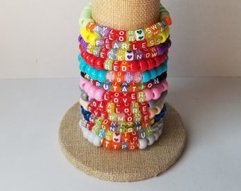 Sets of 12 friendship bracelets, beaded Swiftie bracelets, Eras themed friendship bracelets, stretchy bracelets, swappable concert bracelets