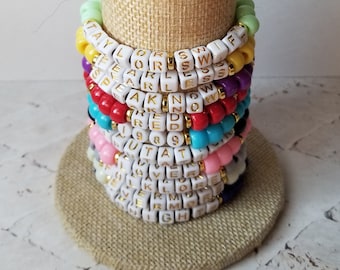 Sets of 10 friendship bracelets, beaded Swiftie bracelets, Eras themed friendship bracelets, stretchy bracelets, swappable concert bracelets