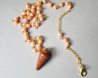 Witches ladder, necklace, pendulum, prayer beads, gold tone, peach glass pearls, Goldstone gemstone pendulum, Pagan, dowsing, divination