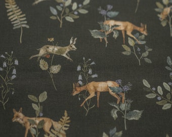 May include: A dark green fabric with a repeating pattern of stylized deer, rabbits, and ferns. The pattern is in shades of brown, green, and blue.