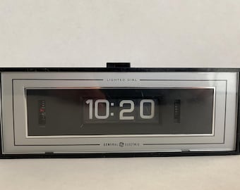 General Electric (GE) Model 8142-4 Flip Number Lighted Dial Alarm Clock