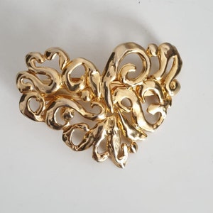 Gold tone metal hair clip-on