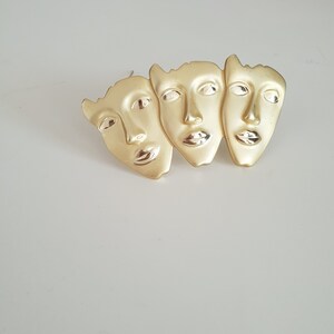 Vintage gold three faces brooch | gold tone brooch