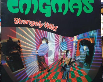 ENIGMAS ~ Extrañamente Salvaje ~ Punk New Wave Vinilo LP en Canadá 1985 Edición canadiense