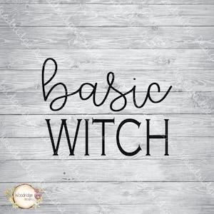 May include: Black text on a gray wooden background reads "basic WITCH" in a mix of cursive and block lettering. The words are centered, with "basic" in a flowing script above "WITCH" in bold capital letters.