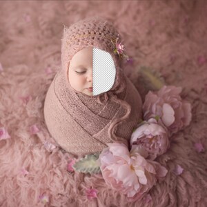 May include: A newborn baby wrapped in a pink swaddle, wearing a crocheted hat, and surrounded by pink flowers. The baby's eyes are closed and the baby is sleeping peacefully.