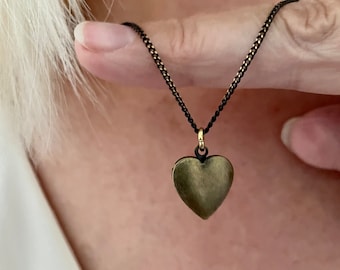 Tiny heart locket with photos