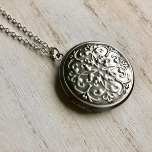 Antique Silver Photo Locket with floral vine embossed design