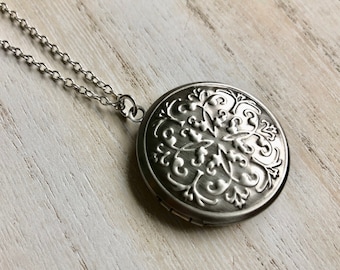 Antique Silver Photo Locket with floral vine embossed design
