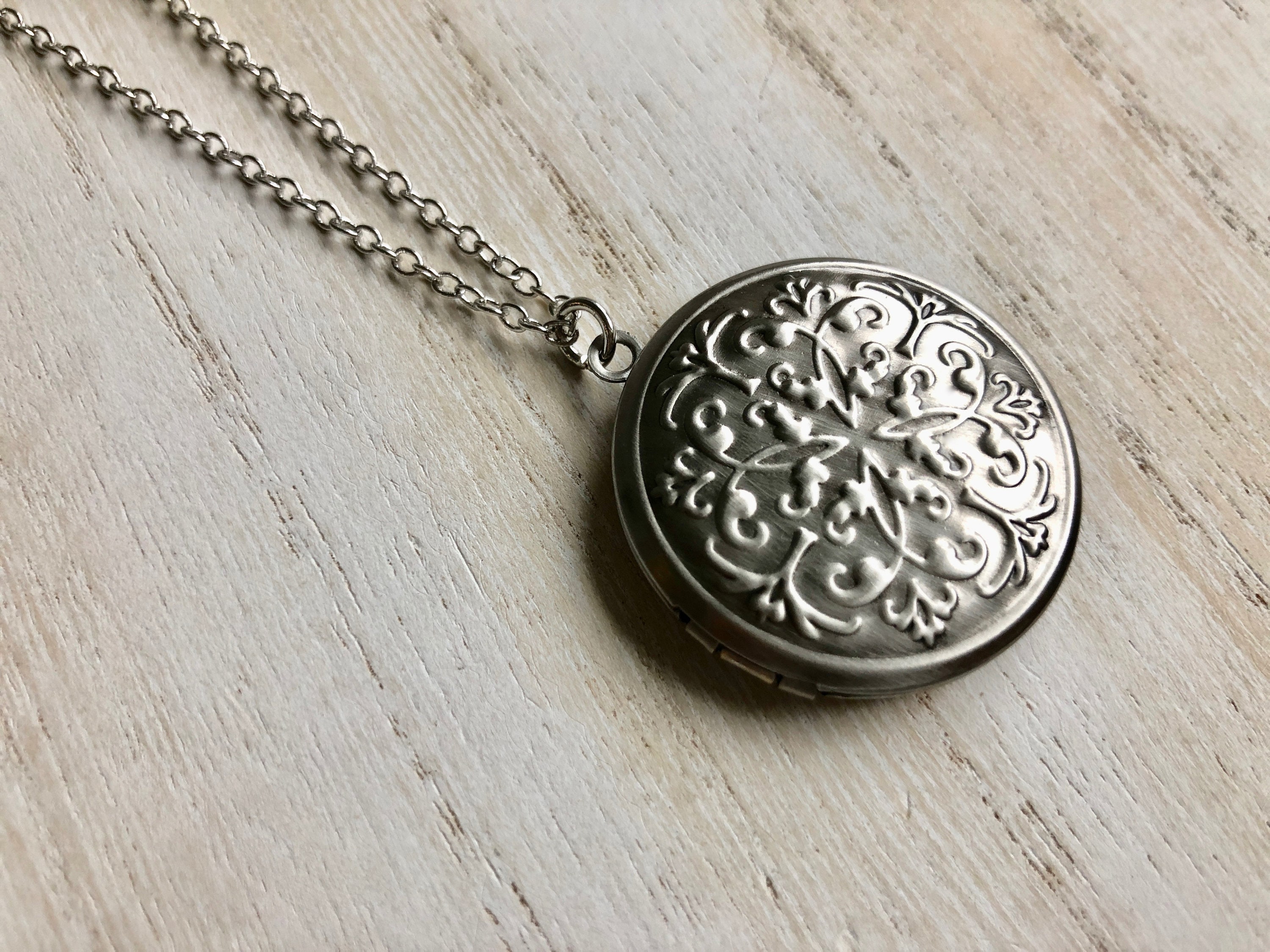 Antique Silver Photo Locket with floral vine embossed design