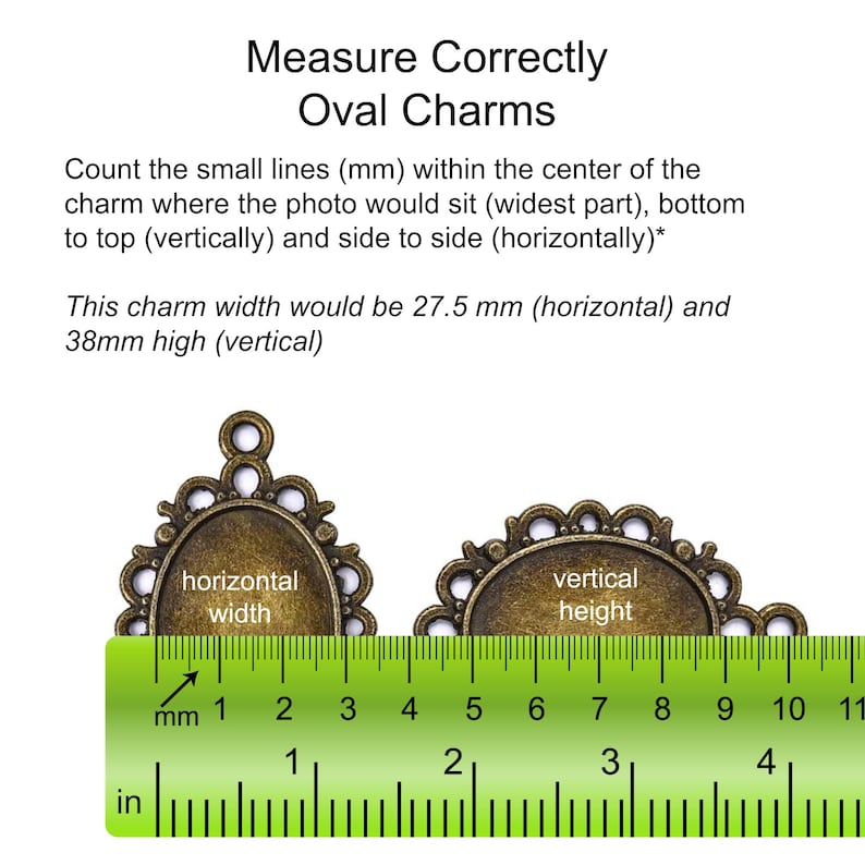 May include: Two oval-shaped metal charms with a ruler underneath. The charms are antique gold in color and have a decorative border. The ruler is green and has markings in inches and millimeters. The text on the charms reads "horizontal width" and "vertical height".