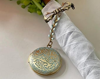 Something blue wedding bouquet locket holds two photos