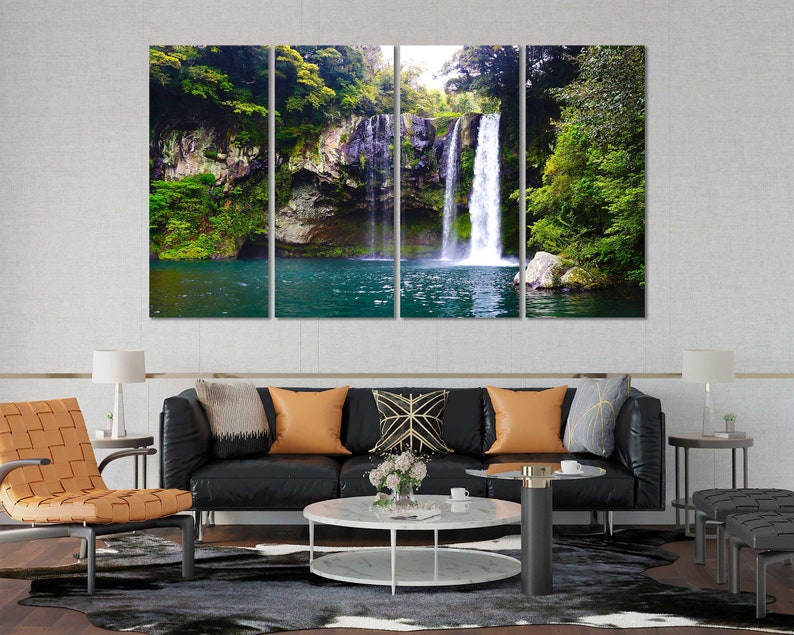May include: A multi-panel canvas print featuring a waterfall cascading down a rocky cliff face, surrounded by lush green foliage. The water is a vibrant turquoise color, and the surrounding trees are a deep green.