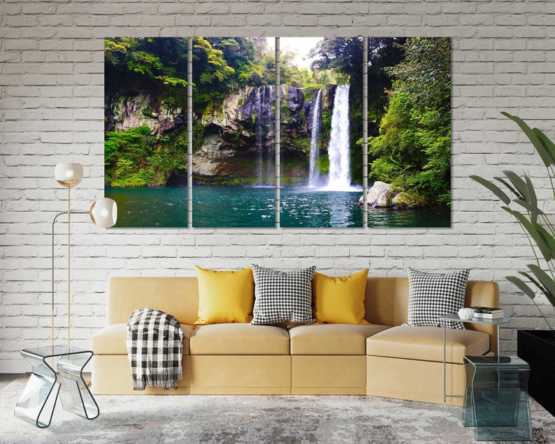 May include: A multi-panel canvas print featuring a waterfall cascading down a rocky cliffside, surrounded by lush green foliage. The water is a vibrant turquoise, and the scene is tranquil and serene.