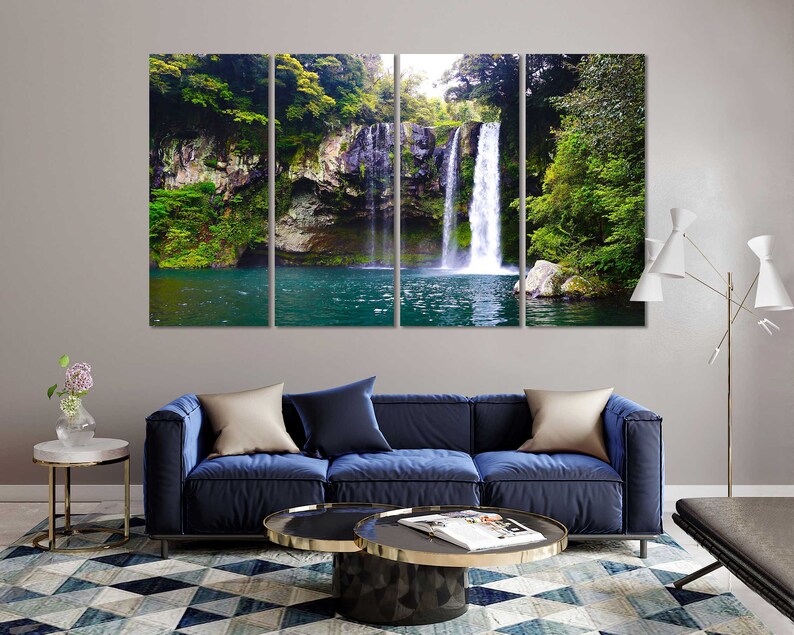 May include: A multi-panel canvas print featuring a lush green forest with a cascading waterfall flowing into a clear blue pool of water.